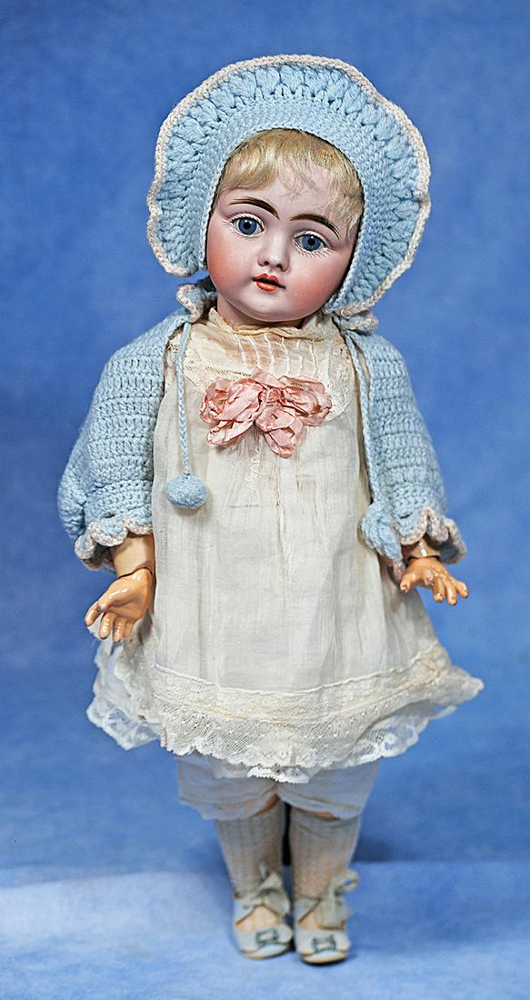 GERMAN BISQUE CHARACTER, UNMARKED 143, BY KESTNER: 149. GERMAN BISQUE CHARACTER, UNMARKED 143, BY KESTNER. 13”. Marks: C made in Germany 7. Bisque socket head, blue sleep eyes, painted lashes, feathered brows, open mouth, accented lips, two uppe