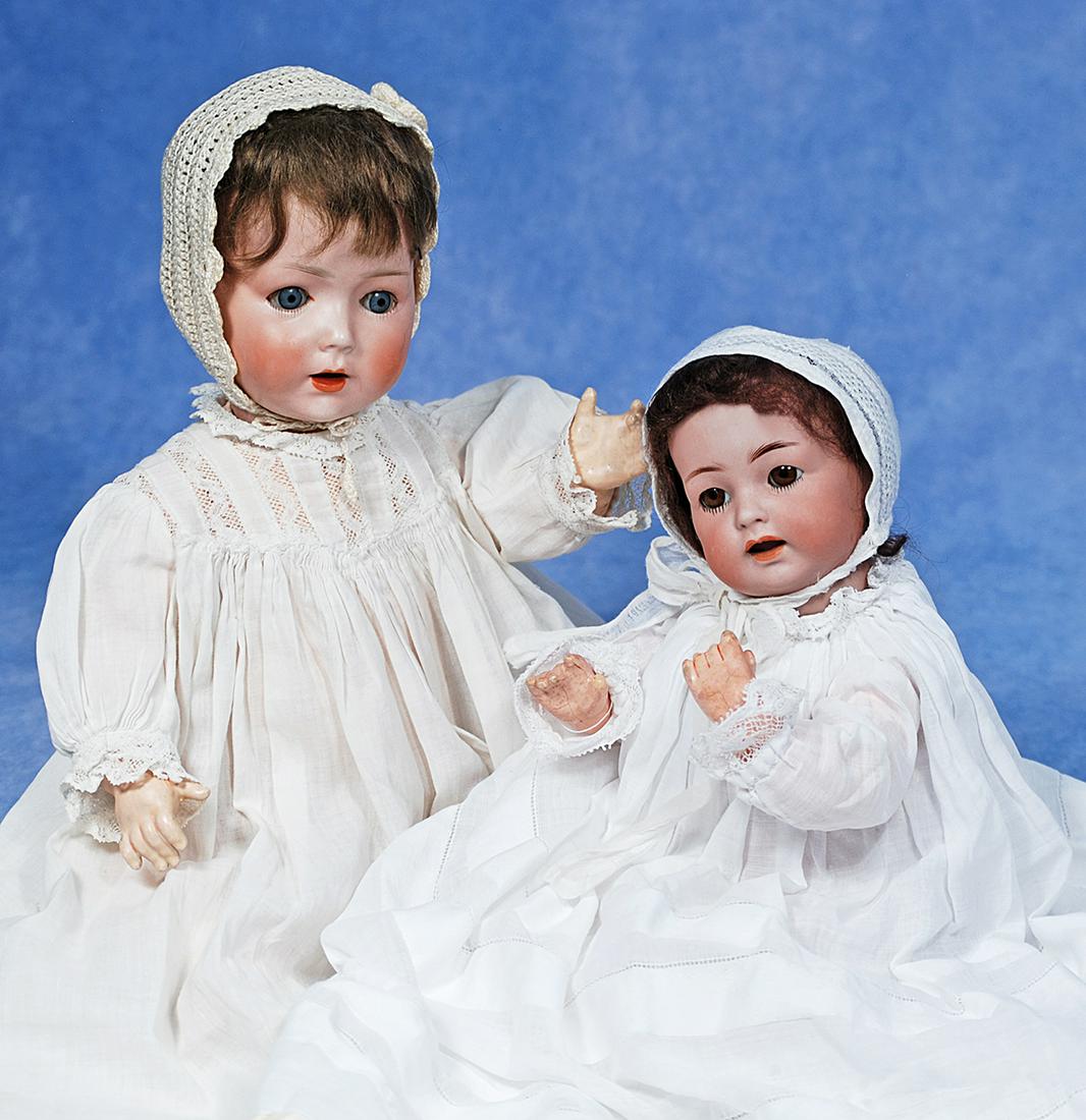 TWO GERMAN BISQUE CHARACTER BABIES: 180. TWO GERMAN BISQUE CHARACTER BABIES. (1) 14” doll by Schoenau & Hoffmeister. Marks: S PB H 0/X Germany. Bisque socket head, blue sleep eyes, painted lower lashes, feathered brows, open mouth