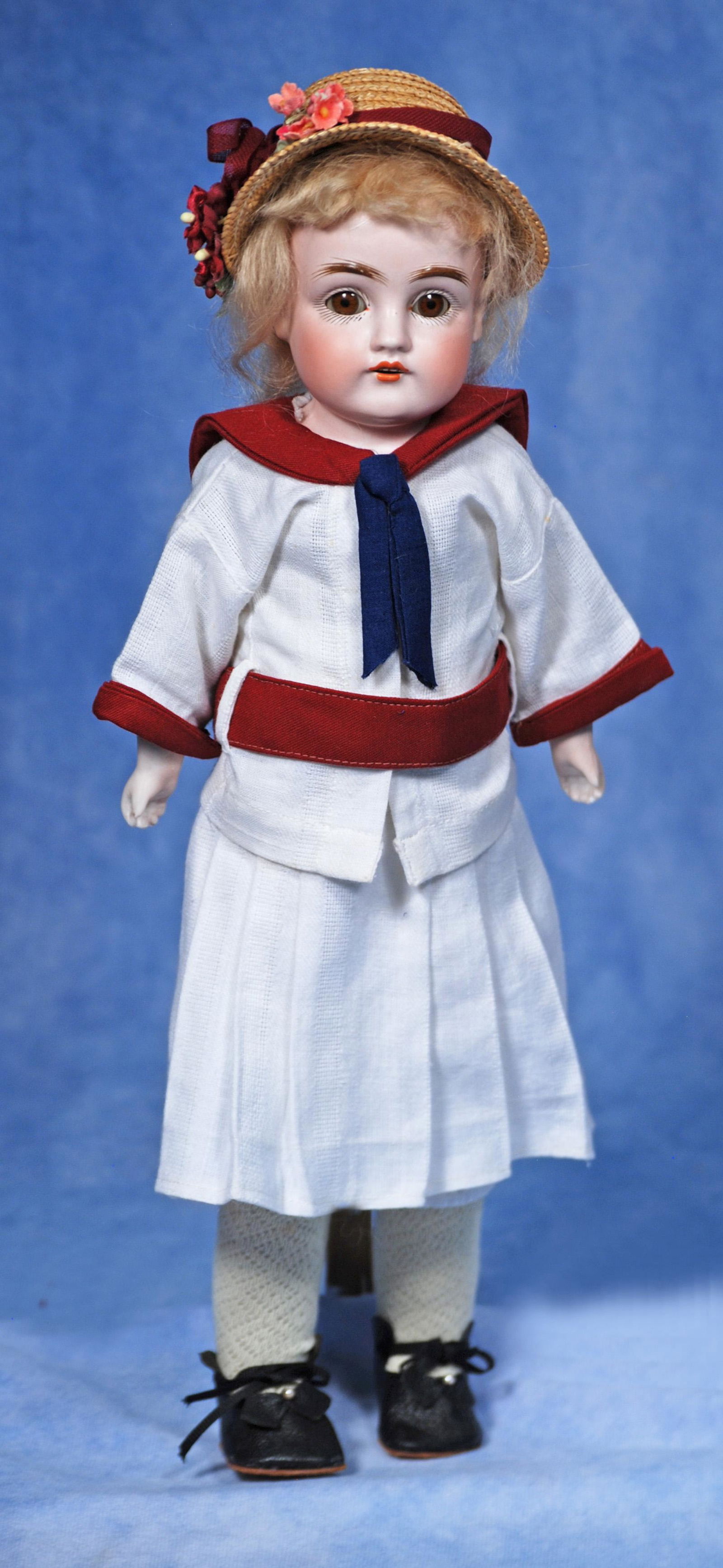 GERMAN BISQUE DOLL BY KESNTER: 267. GERMAN BISQUE DOLL BY KESNTER. 15”. Marks: 154 dep. Bisque shoulderhead, brown sleep eyes, painted lashes, feathered brows, open mouth, upper teeth, original blonde mohair wig and plaster p