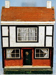 ENGLISH TUDOR STYLE DOLL HOUSE.