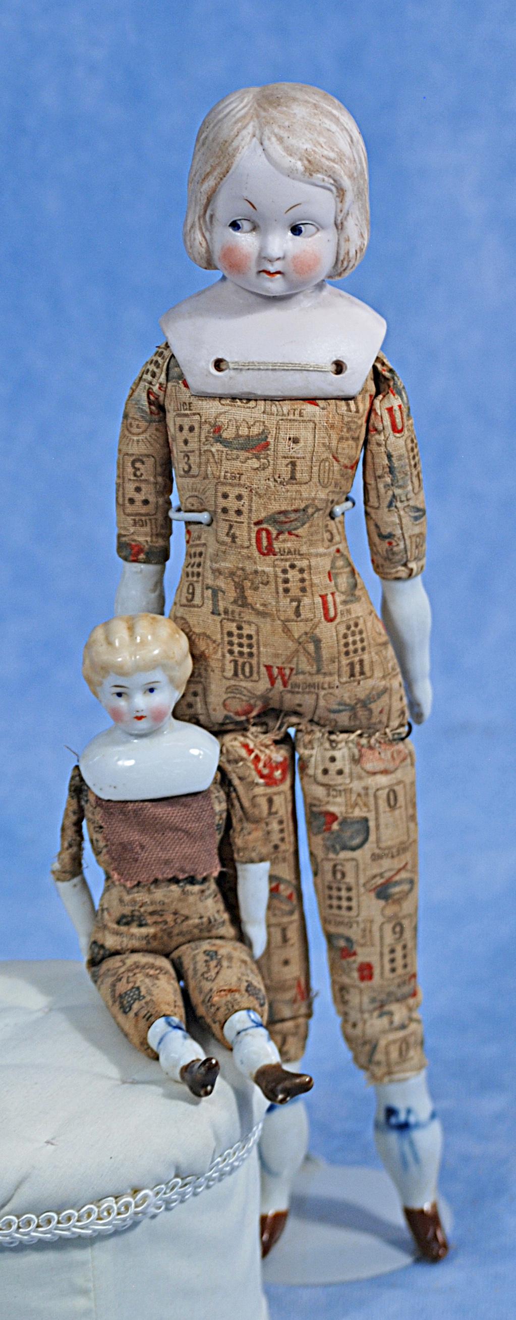 TWO DOLLS WITH PRINTED CLOTH BODY (1 of 1)