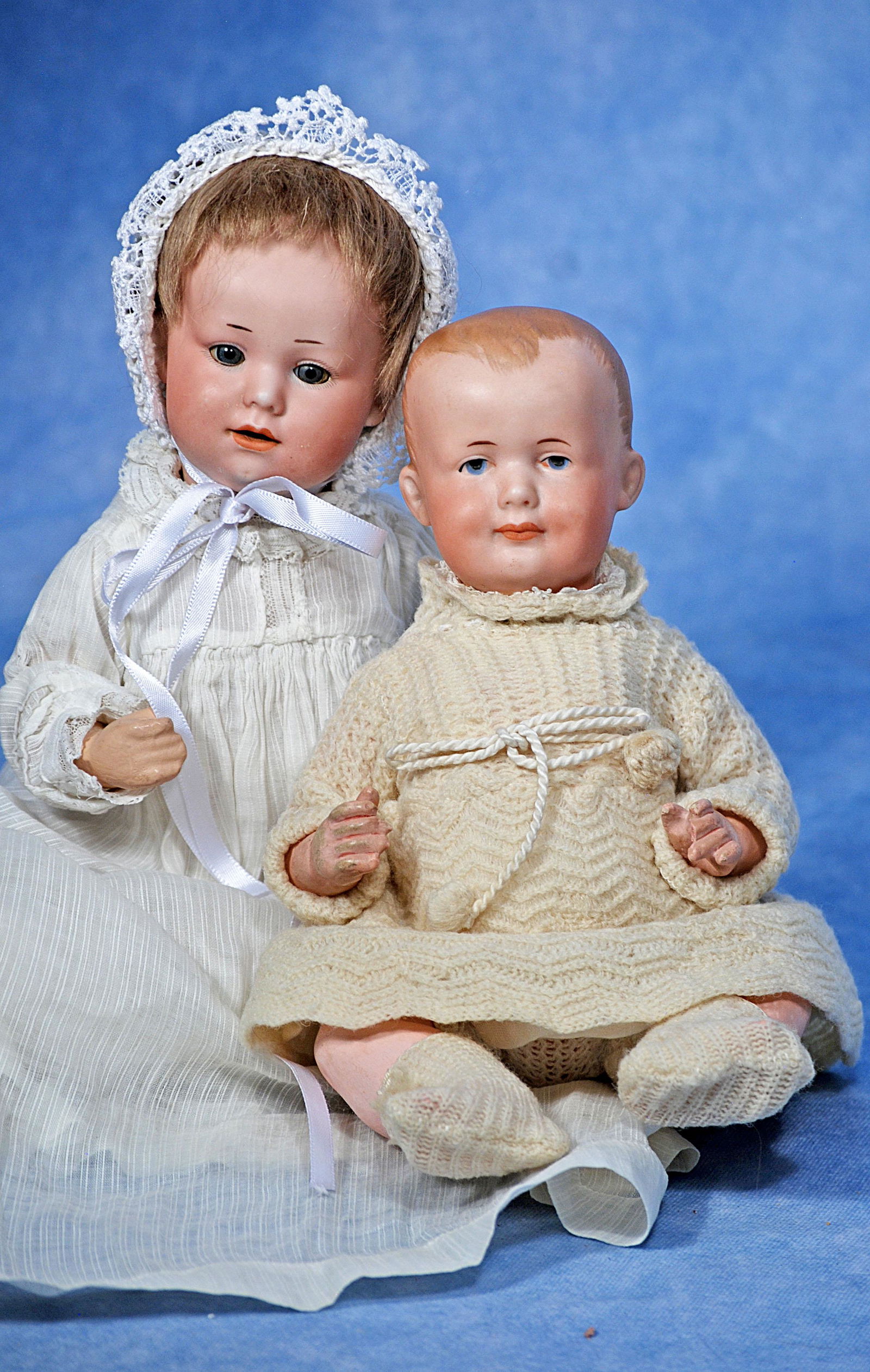 TWO GERMAN BISQUE CHARACTER BABIES BY MARSEILLE: TWO GERMAN BISQUE CHARACTER BABIES BY MARSEILLE. (1) 12” baby marked G.B. 251 A. M., socket head, blue sleep eyes, open mouth, accented lips, upper teeth, original mohair wig, composition baby b