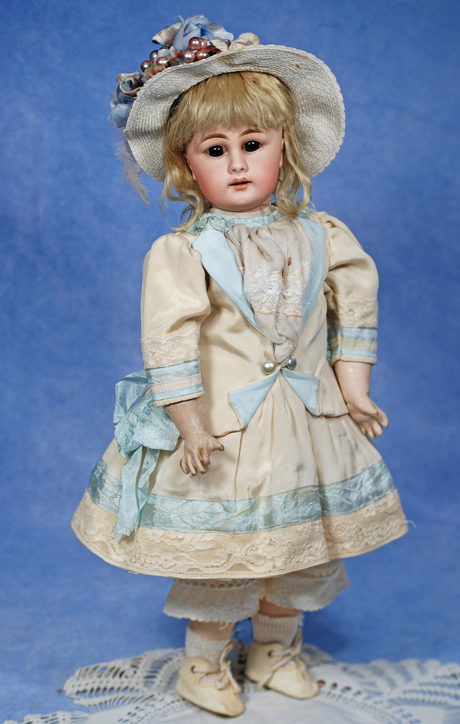 GERMAN BISQUE CHILD, 939, BY SIMON & HALBIG: GERMAN BISQUE CHILD, 939, BY SIMON & HALBIG. 18”. Marks: S 10 H 939. Bisque socket head, long-face modelling, stationary brown glass eyes, painted lashes, feathered brows, pierced ears, open mou