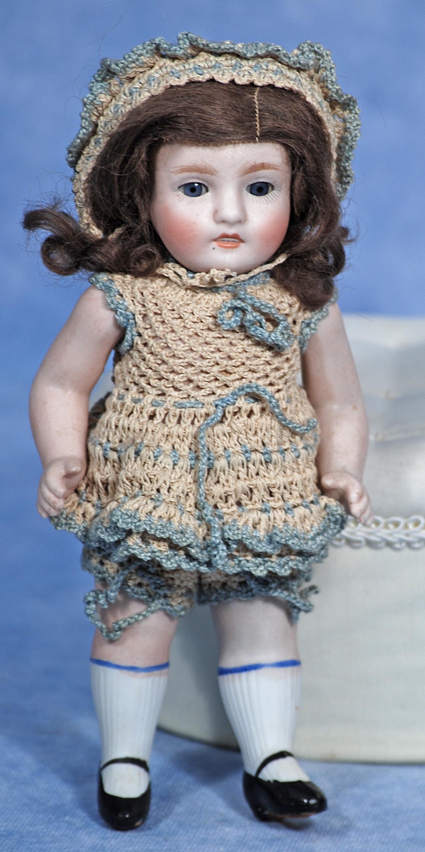 GERMAN ALL-BISQUE DOLL BY ALT, BECK & GOTTSCHLACK: GERMAN ALL-BISQUE DOLL BY ALT, BECK & GOTTSCHLACK. Marks: 83/150. 7”. All-bisque with blue glass sleep eyes, painted lashes, feathered brows, open/closed mouth with painted teeth, jointed should