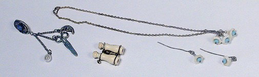 FRENCH FASHION DOLL ACCESSORIES: Includes: 2 ¾" L. chain with scissors and accessories suspended from jeweled oval with belt hook; 1"carved bone opera glasses, plus necklace and matching earrings. Commentary: Excellent condition.