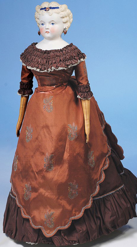 GERMAN BISQUE PARIAN-TYPE LADY WITH BLUE HAIR RIBBO: Marks: 20. 22". Bisque shoulderhead, rounded facial modeling, molded and painted blonde hair in short ringlet curls with center forehead curls, blue painted hair ribbon and bow, painted features, shad