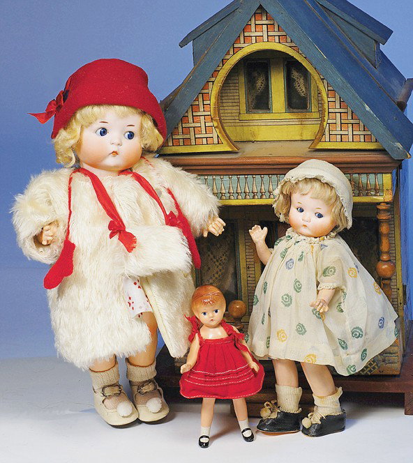 "JUST ME" GERMAN BISQUE CHARACTER BY MARSEILLE: Marks: Just ME Registered Germany A 310/7 M. 9". Bisque socket head, blue side-glancing and sleep eyes, painted lashes, short tapered brows, plump cheeks, tiny closed mouth, original blonde mohair wig