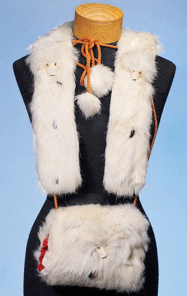 ANTIQUE WHITE FUR COLLAR & MUFF: Lush white fur collar and muff with dog faces and faux ermine tails, rose-color corded ties; muff has ruby cotton sateen lining. Length of collar 32"; muff 5". Commentary: Fine mid-19th century access