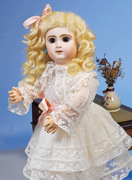 BEAUTIFUL JUMEAU FRENCH BISQUE BEBE: Marks: 9. 19 ½". Bisque socket head, brown paperweight eyes, eyeliner, lushly-painted long eyelashes, feathered and brushstroked brows, pierced ears, closed mouth with shaded and accented soft pink l