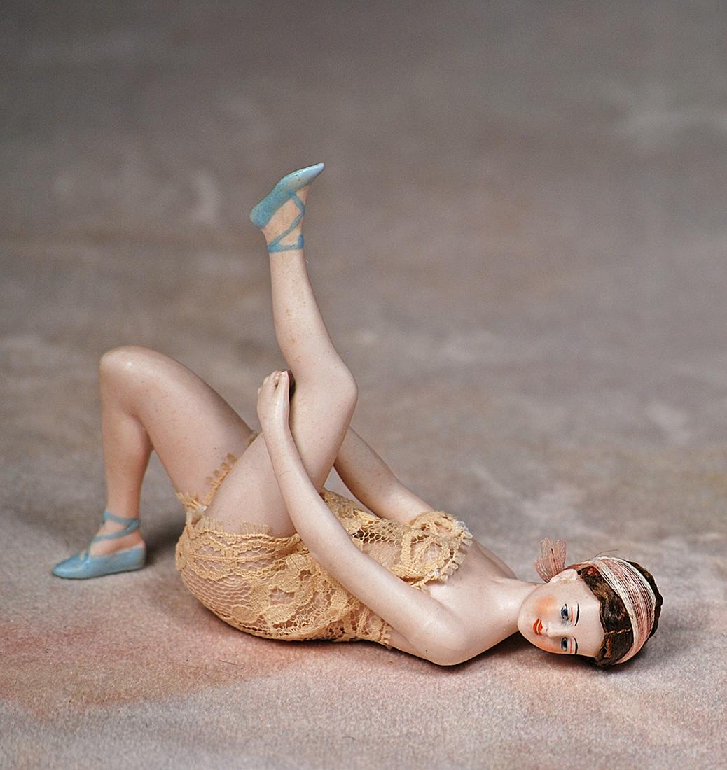 GALLUBA AND HOFFMAN BISQUE BATHING BEAUTY STRETCHING LEG (1 of 1)