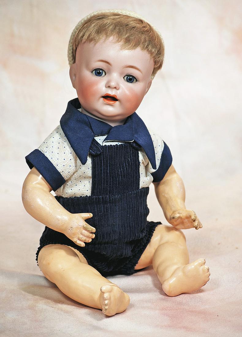 GERMAN BISQUE CHARACTER BABY, 122, BY KAMMER AND REINHARDT: 271. GERMAN BISQUE CHARACTER BABY, 122, BY KAMMER AND REINHARDT. 15”. Marks: K * R, Simon & Halbig 122. Bisque socket hread, blue sleep eyes, painted lashes, feathered brows, open mouth, accente
