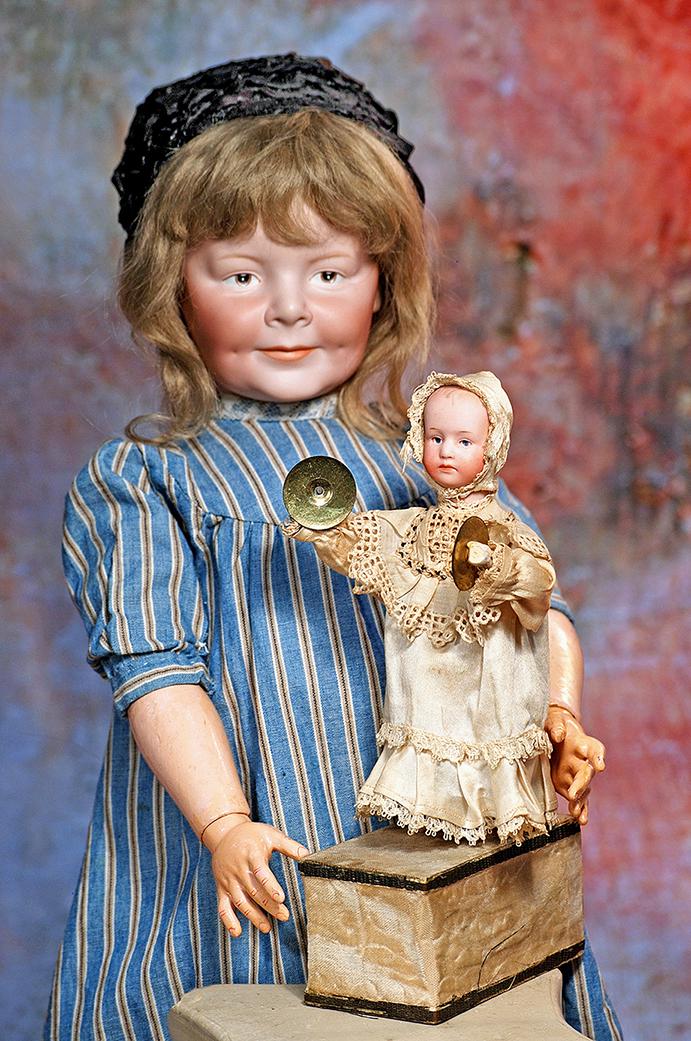 GEBRUDER HEUBACH BISQUE BABY WITH BRASS CYMBALS AND CLAPPING MECHANISM (1 of 2)