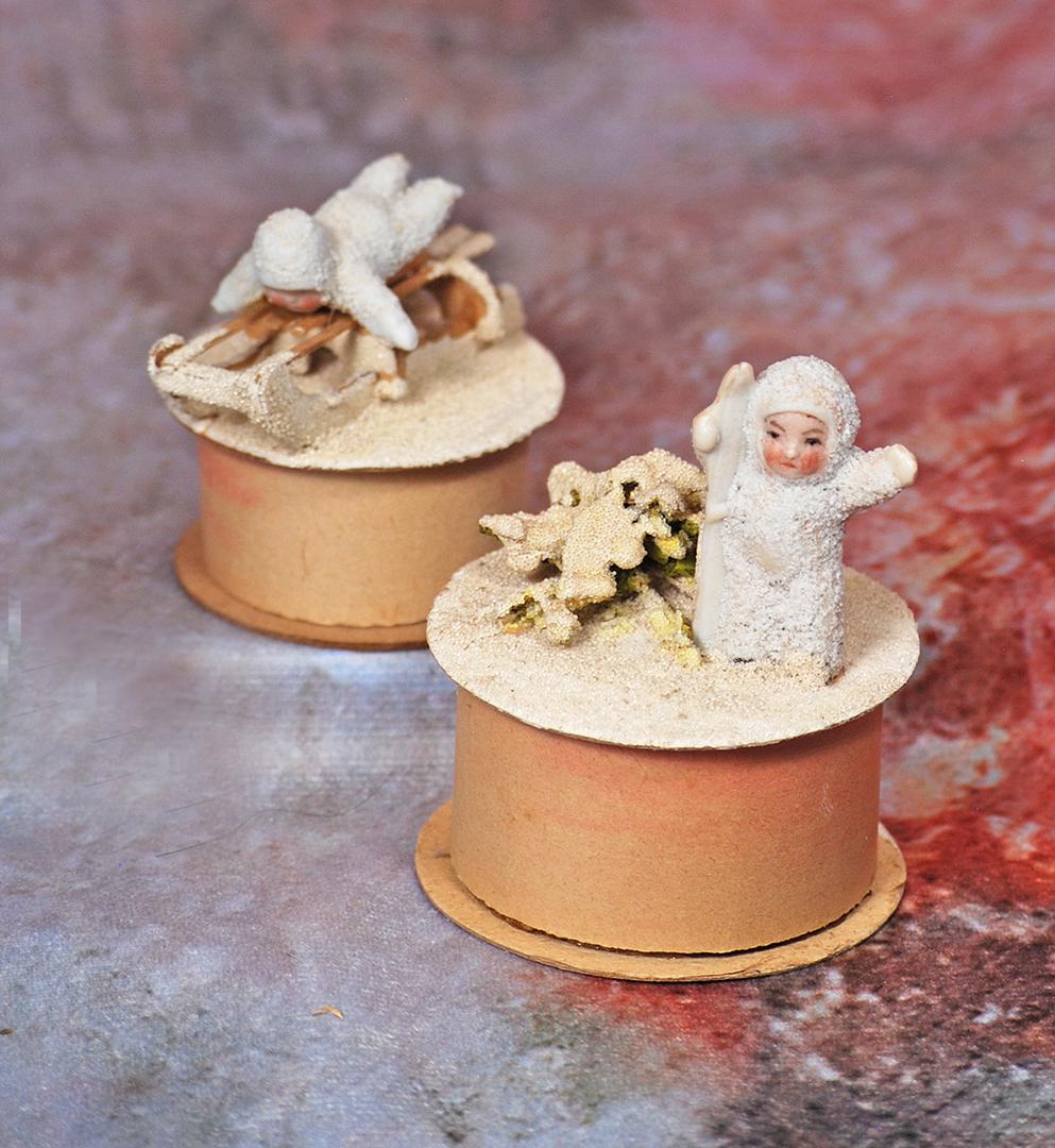 TWO GERMAN BISQUE SNOW BABY CANDY CONTAINERS (1 of 1)