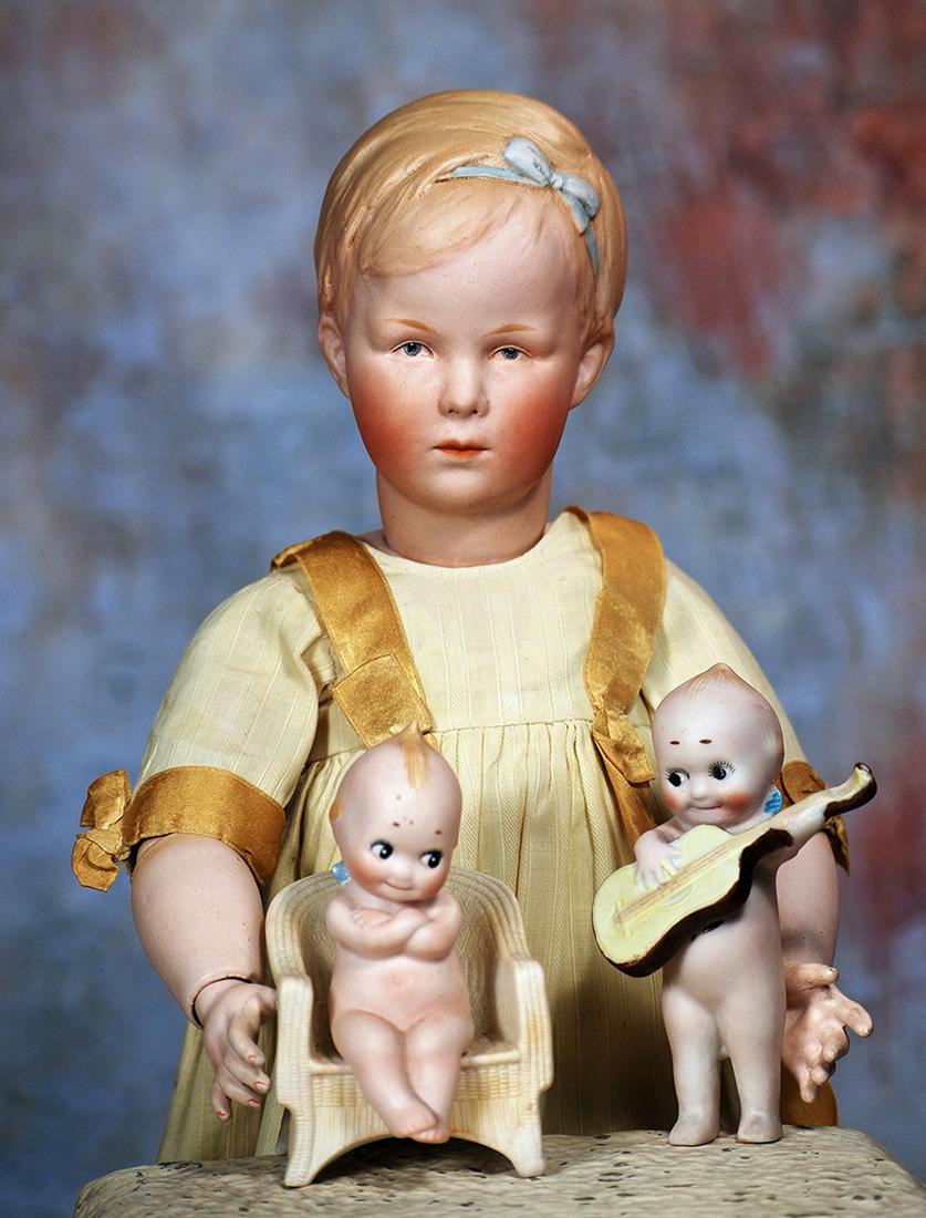 TWO GERMAN ALL-BISQUE KEWPIE FIGURALS (1 of 2)