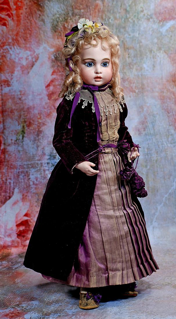 BEAUTIFUL FRENCH BISQUE BEBE BRU CIRCLE DOT: 195. BEAUTIFUL FRENCH BISQUE BEBE BRU CIRCLE DOT. 20”. Marks: Bru Jne circle and dot (head); Bru 8 (shoulderplate). Bisque swivel head on bisque shoulderplate with molded bosom, blue paperweight