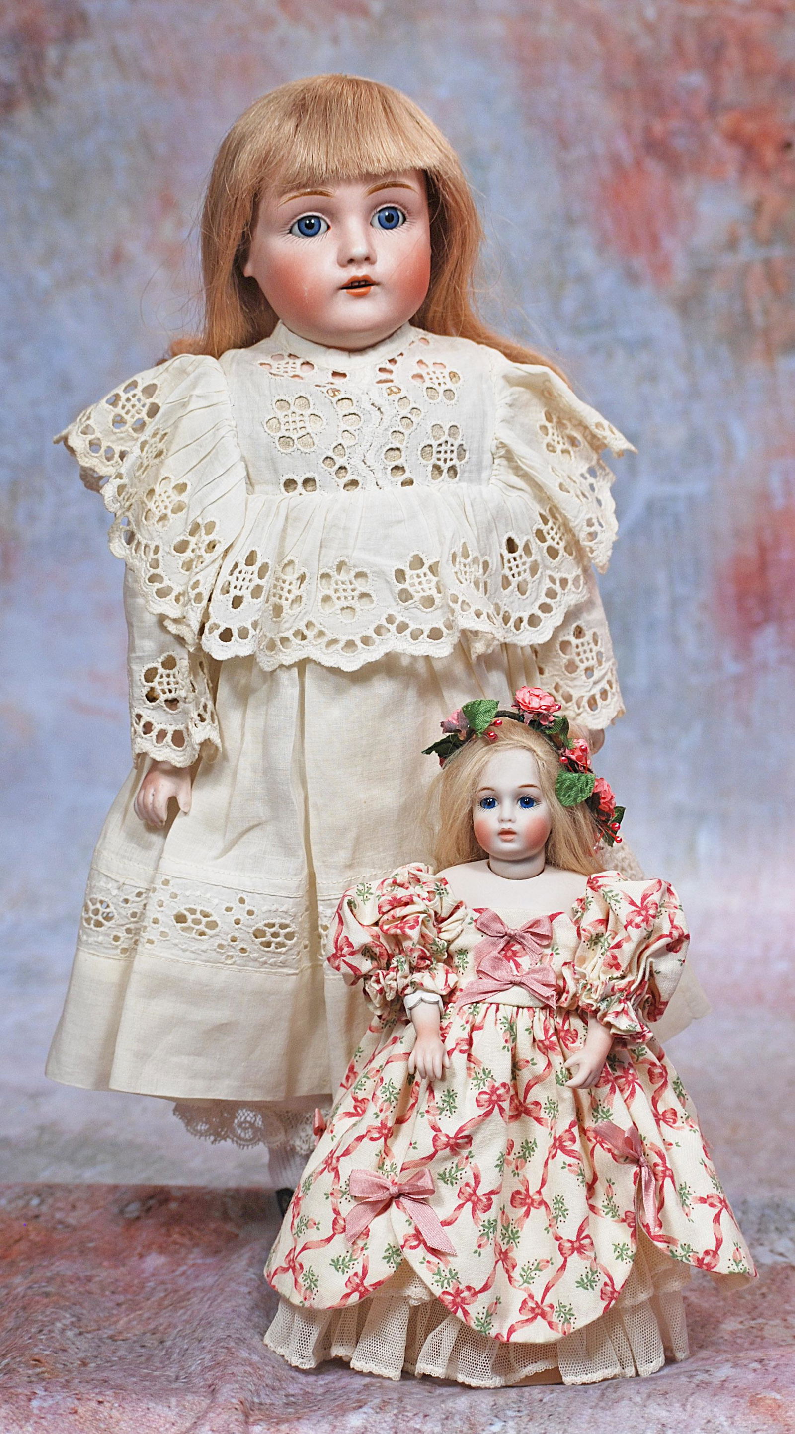 KESTNER BISQUE CHILD WITH TINY ARTIST BRU BEBE: 270. KESTNER BISQUE CHILD WITH TINY ARTIST BRU BEBE. 15”. Marks: 154 dep. Bisque shoulderhead, blue sleep eyes, painted lashes, feathered brows, open mouth, upper teeth, blonde human hair wig ov