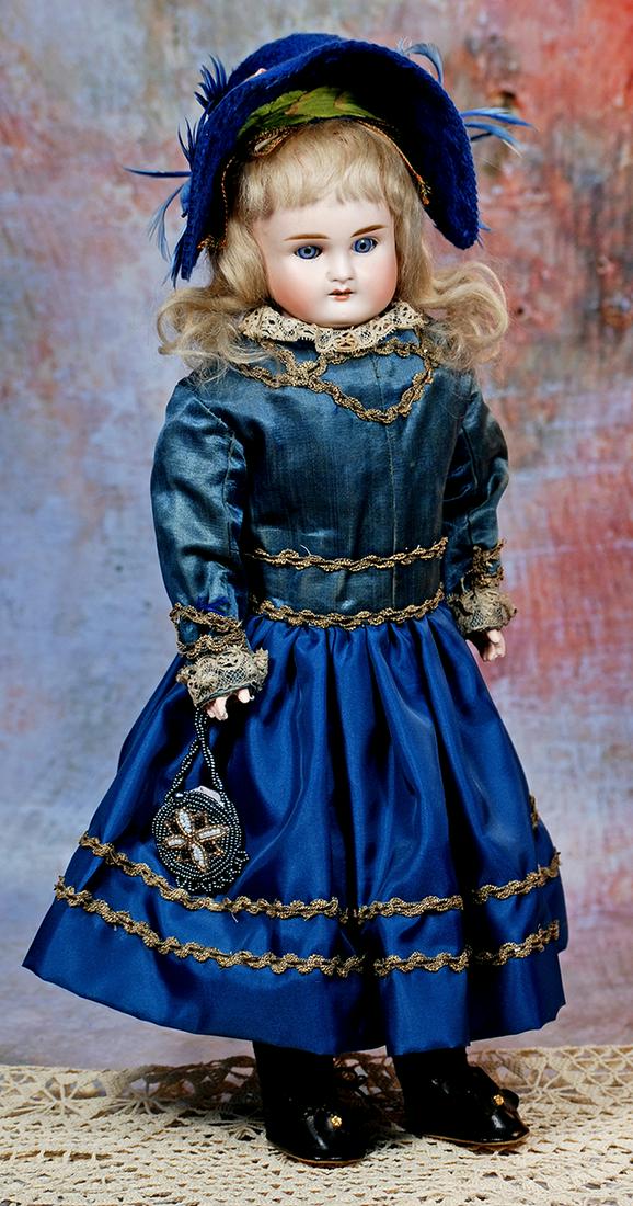 GERMAN BISQUE DOLL BY KESTNER: 283. GERMAN BISQUE DOLL BY KESTNER. 18”. Marks: 7 ½. Turned bisque shoulderhead, blue sleep eyes, painted lashes, feathered brows, open mouth, accented lips, upper teeth, original blonde mo