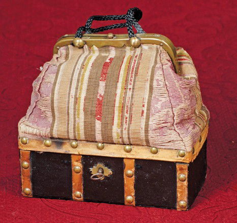 FRENCH DOLL'S SAC DU VOAGE. 7" x 7 ½". Circa 1885: FRENCH DOLL'S SAC DU VOAGE. 7" x 7 ½". Circa 1885 doll's valise has faux-leather-covered wooden base with brown leather straps, brass studs, and brass key; striped canvas top with brass clasp and bra