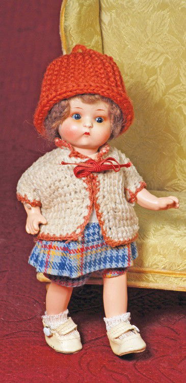 GERMAN BISQUE "JUST ME" CHARACTER BY MARSEILLE. Ma: GERMAN BISQUE "JUST ME" CHARACTER BY MARSEILLE. Marks: Just ME/ A 310 M/Germany. 8". Painted bisque socket head, blue sleep eyes, tapered brows, tiny closed mouth, plump rose-blushed cheeks, original