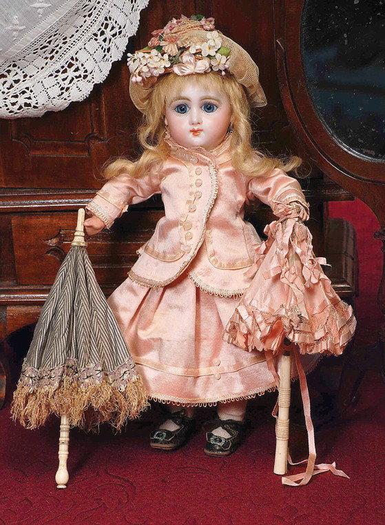 ANTIQUE STRIPED SILK FASHION PARASOL. 8". Ivory h: ANTIQUE STRIPED SILK FASHION PARASOL. 8". Ivory handled parasol with ribbed handle and urn-shaped hand clasp, striped silk cover with wide decorative braid and deep fringe trim, metal fittings, 1" ivo