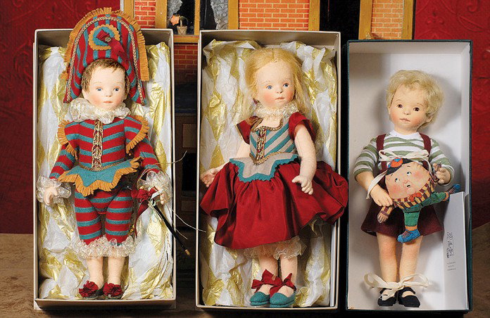 R. JOHN WRIGHT "COLE" AMERICAN CLOTH PORTRAIT DOLL: R. JOHN WRIGHT "COLE" AMERICAN CLOTH PORTRAIT DOLL. 12". All-felt doll with swivel head and jointed shoulders and hips, portraying a young boy with curly blonde hair, painted brown eyes, red and brown