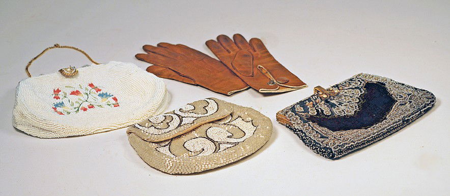 ANTIQUE PURSES AND PAIR OF GLOVES. Includes three: ANTIQUE PURSES AND PAIR OF GLOVES. Includes three fancy beaded purses, 7" W. and 4" to 5" H. Each is heavily beaded with intricate design, two have gold framing and fancy clasp, silk lining, one marke