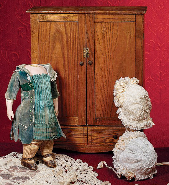 TWO ANTIQUE LACE BONNETS WITH ROSETTES. Alternate: TWO ANTIQUE LACE BONNETS WITH ROSETTES. Alternate rows of embroidering and insertion gathered into lace circle at crown back, edged in lace ruffles with multiple rosettes of silk ribbon trim at front,