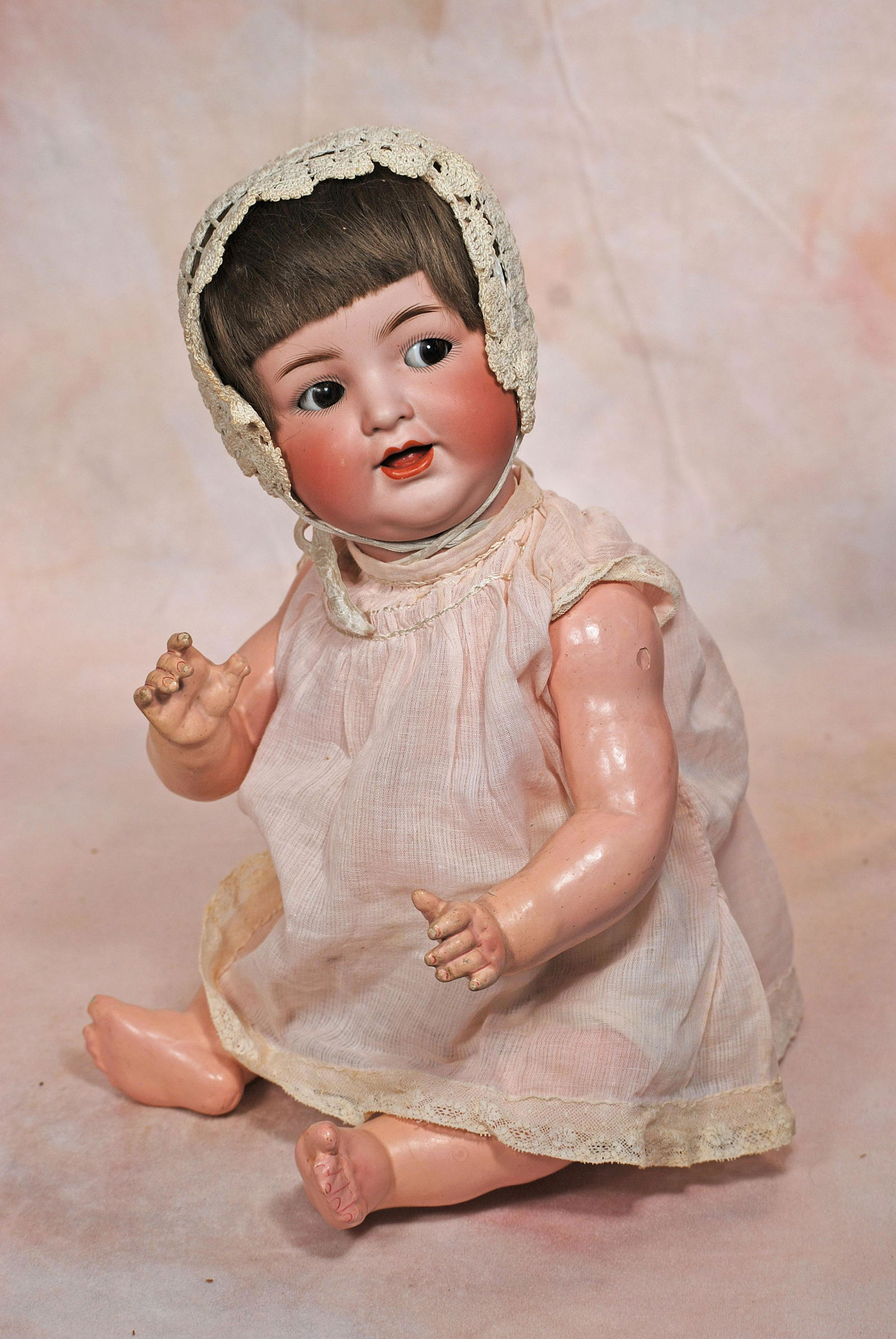 KAMMER & REINHARDT, 126, FLIRTY-EYED CHARACTER BABY: KAMMER & REINHARDT, 126, FLIRTY-EYED CHARACTER BABY. 20”. Marks: K * R Simon Halbig 126. Bisque socket head, brown flirty and sleep eyes, painted lashes, feathered brows, open mouth, tongue, two