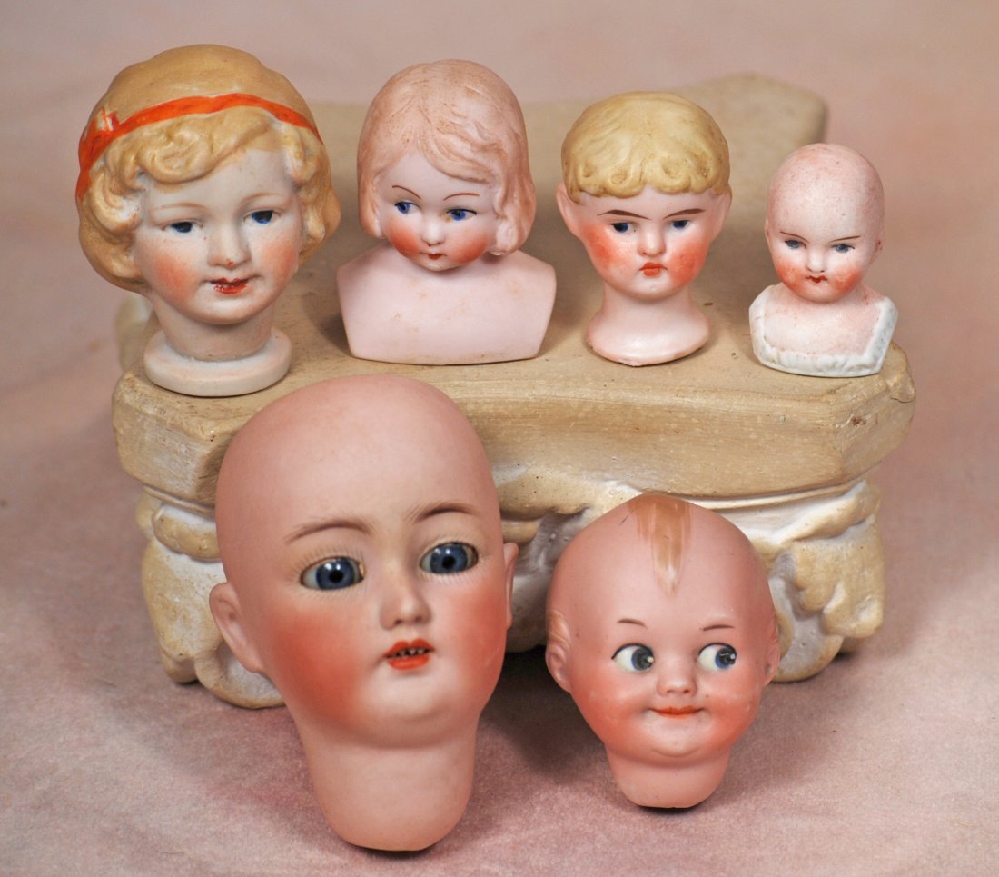 SIX BISQUE DOLL HEADS (1 of 1)