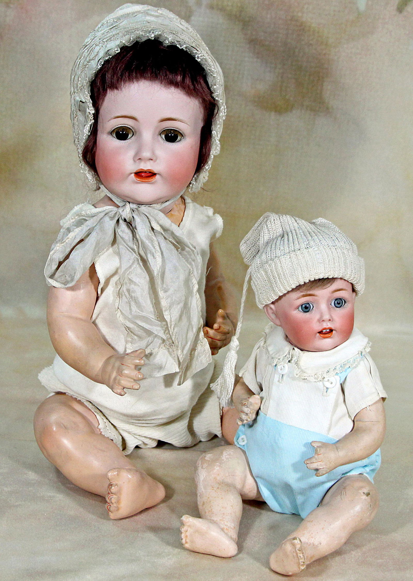 TWO GERMAN BISQUE CHARACTER BABIES, J.D.K. 257, BY KESTNER: TWO GERMAN BISQUE CHARACTER BABIES, J.D.K. 257, BY KESTNER. 18” and 12”, both marked Made in Germany, JDK 257, both with bisque socket head, sleep eyes, painted upper and lower lashes, fea