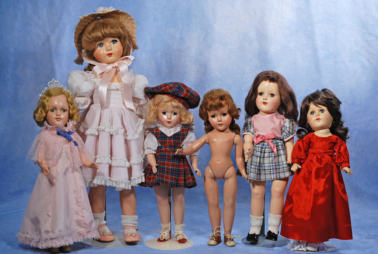 SIX HARD PLASTIC DOLLS (1 of 1)