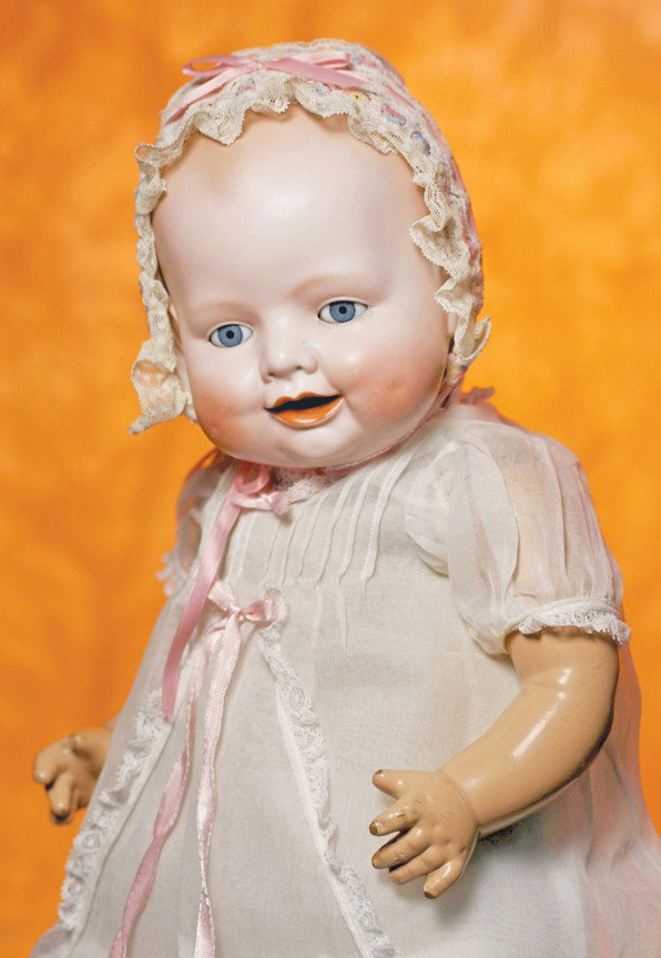 GERMAN BISQUE BONNIE BABE BY AVERILL: GERMAN BISQUE BONNIE BABE BY AVERILL. Marks: Copr. By Georgene Averill 1005/3652/4 Germany. 20". Solid-dome bisque head, flange neck, molded and painted light brown hair, blue sleep eyes, painted lash