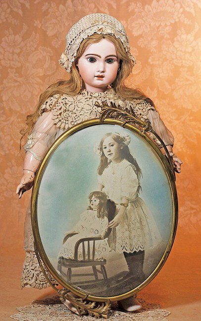 FRENCH BISQUE BEBE BY JUMEAU IN LARGE SIZE 14: FRENCH BISQUE BEBE BY JUMEAU IN LARGE SIZE 14. Marks: 14 (incised); Tallier Fils & Cie, Paris France (shop label on front torso). 32". Bisque socket head, brown paperweight eyes, lushly-painted eyelas