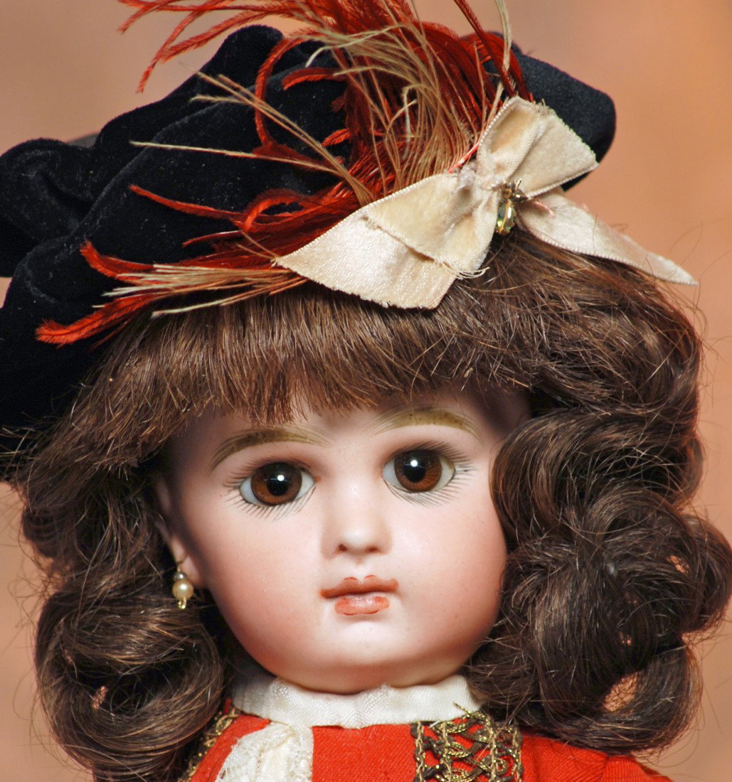 FRENCH BISQUE BROWN-EYED BEAUTY BY JUMEAU: FRENCH BISQUE BROWN-EYED BEAUTY BY JUMEAU. Marks: Depose Tete Jumeau Bte. SGDG 4. 14". Bisque socket head, deep-set brown paperweight eyes, eyeliner, painted thick lashes, feathered and brushstroked b
