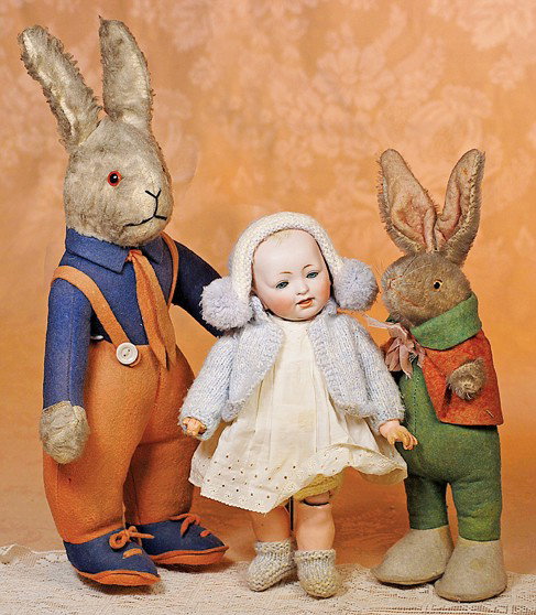TWO EARLY MOHAIR RABBITS BY DEAN'S RAG BOOK OF LON: TWO EARLY MOHAIR RABBITS BY DEAN'S RAG BOOK OF LONDON. Marks: Made in England by Dean's Rag Book Co. Ltd. London. 14" & 17". Gray mohair fur, glass eyes, floss nose and mouth, 14" rabbit has felt-line