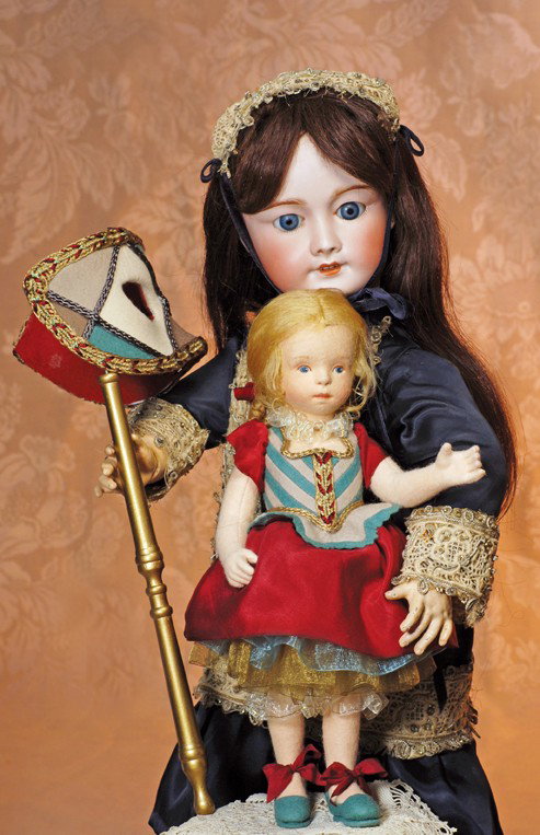 R. JOHN WRIGHT "MUSETTE" CANDY CONTAINER & CARNIV: R. JOHN WRIGHT "MUSETTE" CANDY CONTAINER & CARNIVALE MASK.. 12". All-felt, fully-jointed, handpainted features, blue eyes, closed mouth, blonde mohair wig, felt and silk costume, felt shoes with silk 