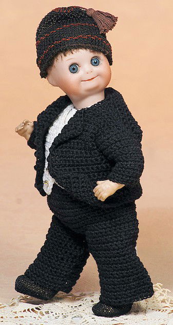 VERY RARE MOLD 9219 GEBRUDER HEUBACH GLASS-EYED GO: VERY RARE MOLD 9219 GEBRUDER HEUBACH GLASS-EYED GOOGLY. Marks: 9219/Heubach in square/ 3/0 Germany. 9". Bisque socket head, blue side-glancing and sleep eyes, painted curly lashes, tapered brows, butt