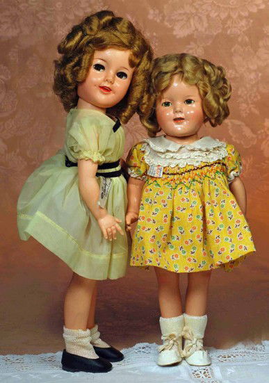 1957 SHIRLEY TEMPLE IN YELLOW PARTY DRESS: 1957 SHIRLEY TEMPLE IN YELLOW PARTY DRESS. Marks: Ideal Doll, ST 17. 17". Vinyl socket head on hard vinyl jointed body, flirty eyes, open/closed mouth, rooted synthetic wig, tagged yellow organdy part