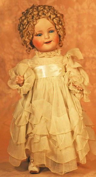 GERMAN COMPOSITION SHIRLEY TEMPLE BY BORGFELDT: GERMAN COMPOSITION SHIRLEY TEMPLE BY BORGFELDT. Marks: S.T. O./G.B./Germany. 18". Composition socket head on five-piece jointed body, blue sleep eyes, feathered brows, smiling open mouth, upper teeth,