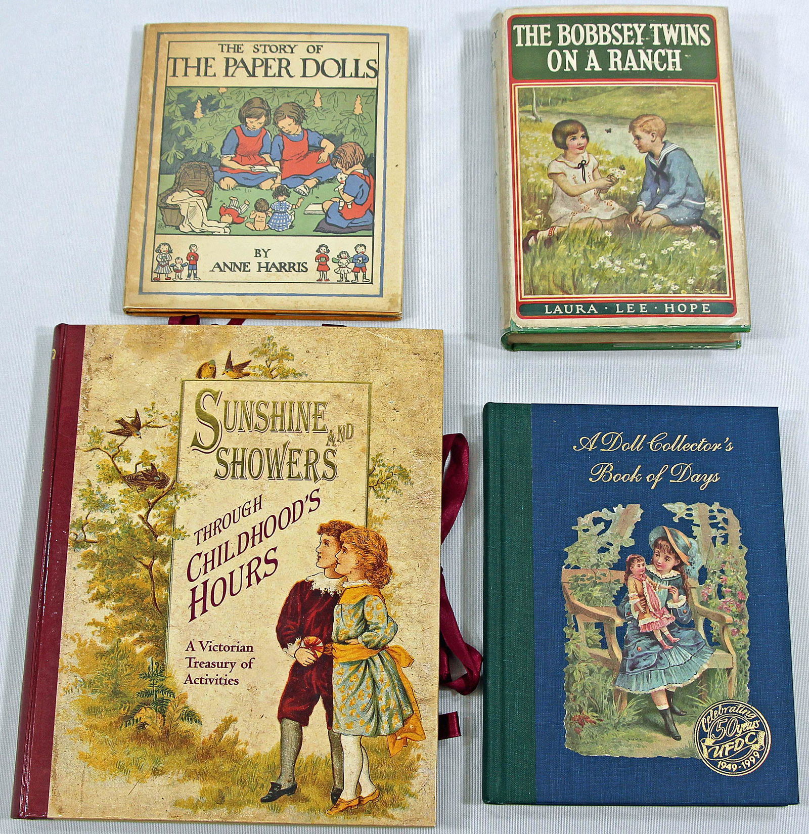 FOUR PAPER DOLLS AND CHILDREN'S BOOKS (1 of 2)