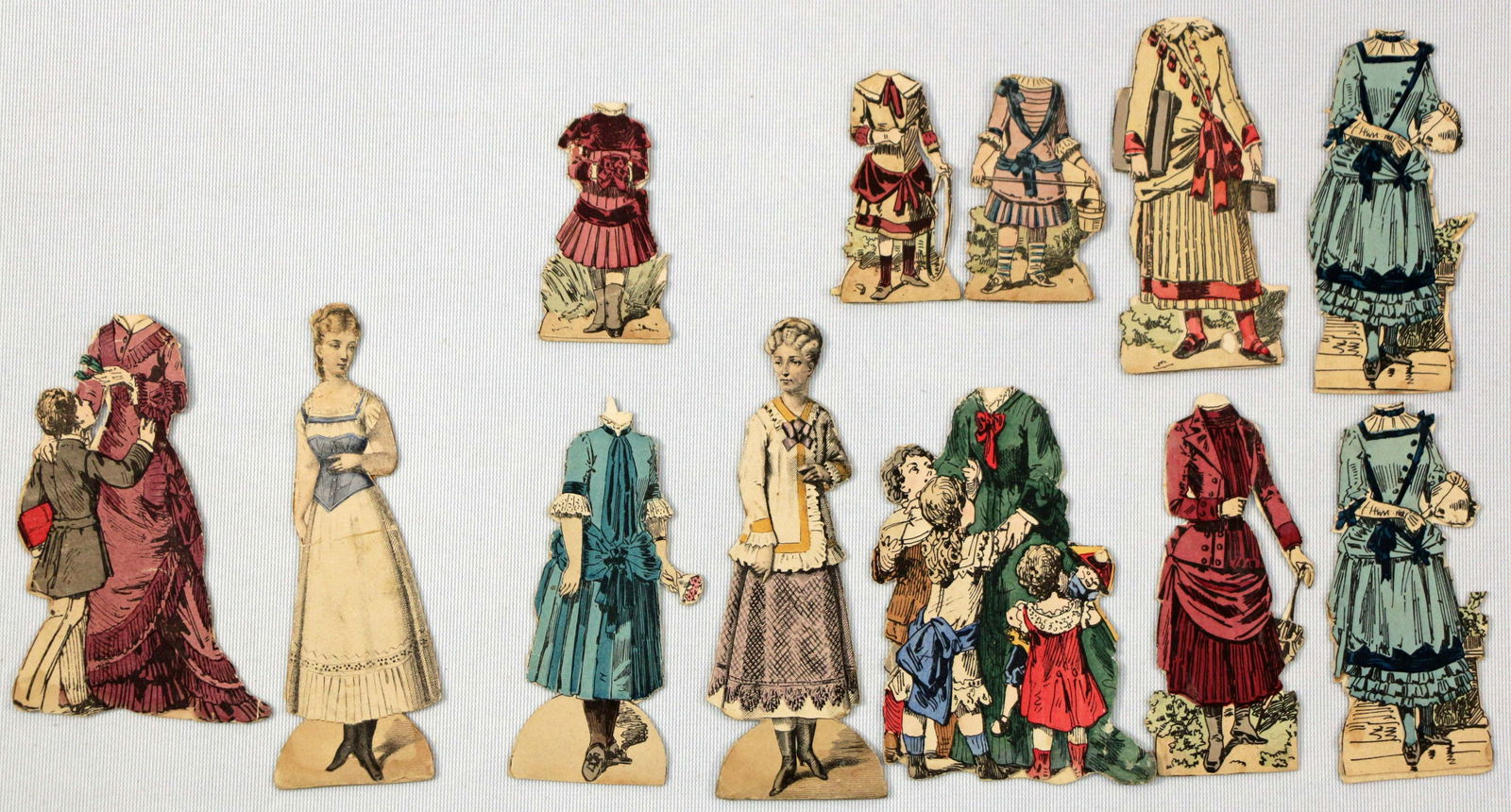 TWO "LA POUPEE MODELE" PAPER DOLLS WITH CHILDREN. (1 of 2)