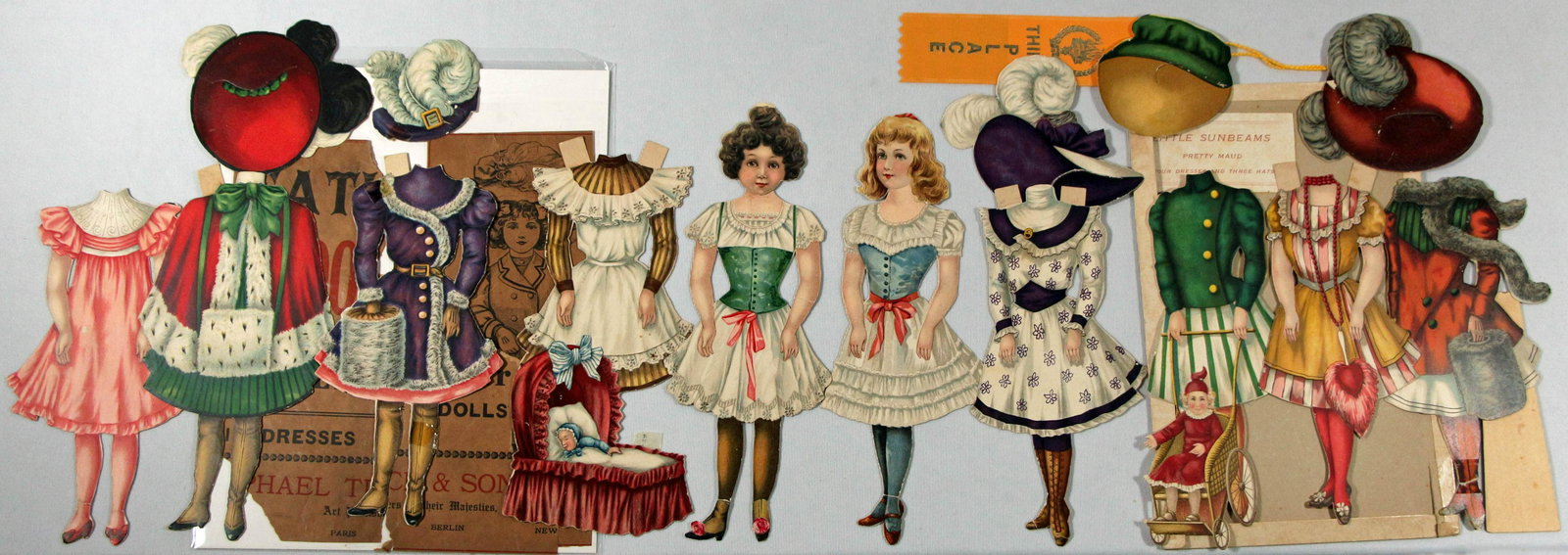 TWO SUNBEAM SERIES PAPER DOLL SETS BY RAPHAEL TUCK. (1 of 2)