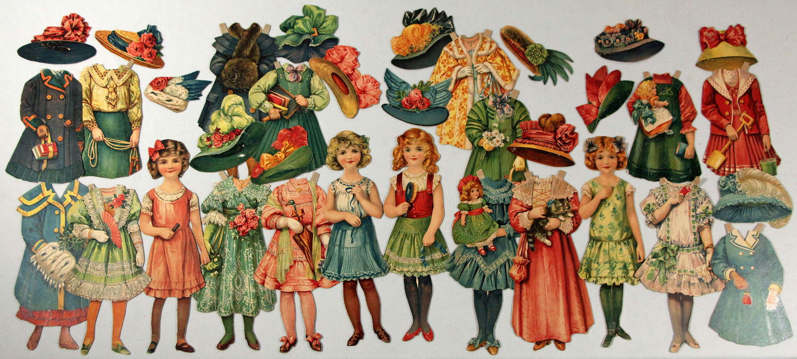 FOUR SETS, LITTLE DARLING SERIES PAPER DOLLS BY RAPHAEL TUCK. (1 of 2)