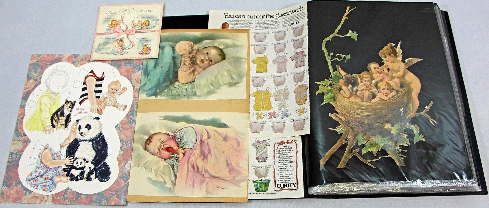 LARGE FOLIO WITH BABIES PAPER DOLLS AND RELATED ITEMS (1 of 3)