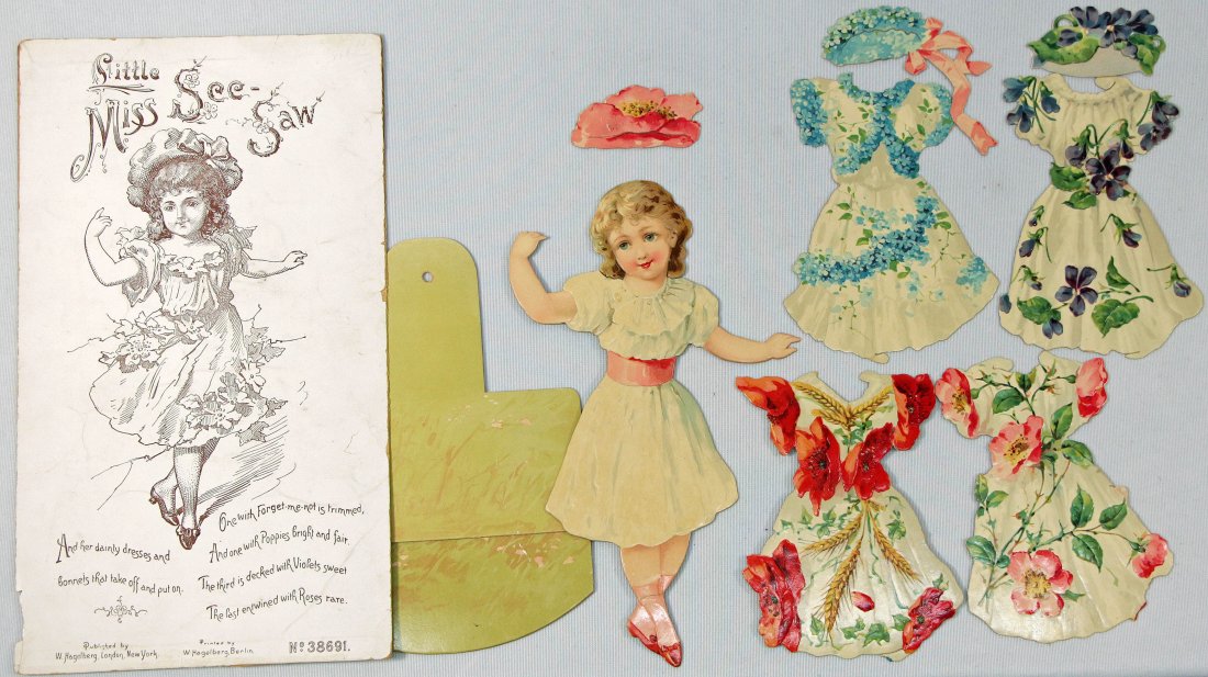RARE GERMAN PAPER DOLL BY HAGELBERG: 226. RARE GERMAN PAPER DOLL BY HAGELBERG. 9" "Little Miss See-Saw" heavy cardboard one sided, engraved and lithographed paper doll in a ballerina position with self-stand, four beautiful dresses and t