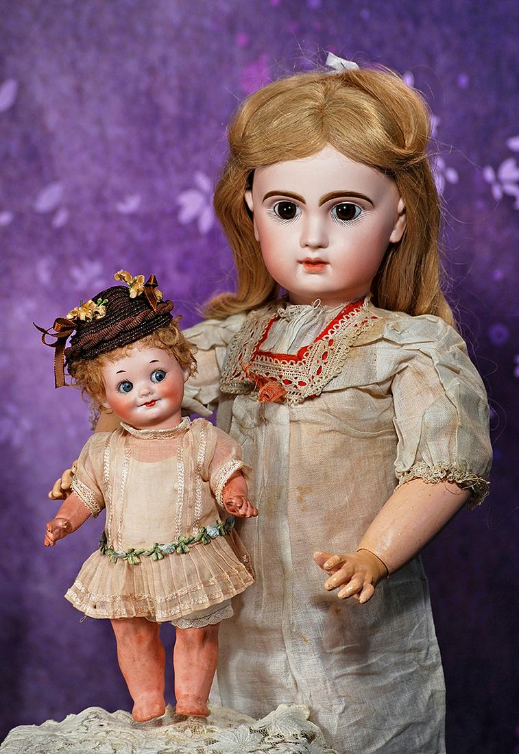 FRENCH BISQUE BROWN-EYED BEBE BY JUMEAU.  20”.  Marks: Depose Tete Jumeau Bte SGDG (head); (1 of 2)
