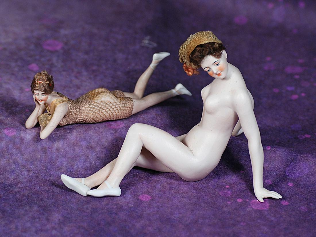 TWO GERMAN BISQUE BATHING BEAUTIES BY GALLUBA AND HOFFMAN. Each is nude bisque figure of woman with: TWO GERMAN BISQUE BATHING BEAUTIES BY GALLUBA AND HOFFMAN. Each is nude bisque figure of woman with painted features and original mohair wig; includes 3.5” x 5” doll in seated pose; one be