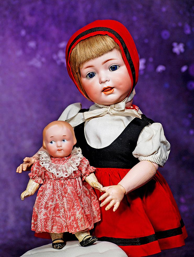 GERMAN BISQUE GOOGLY BY MARSEILLE.  6 ½”.  Marks: 2/0 A 210 M.  Bisque socket head with (1 of 2)