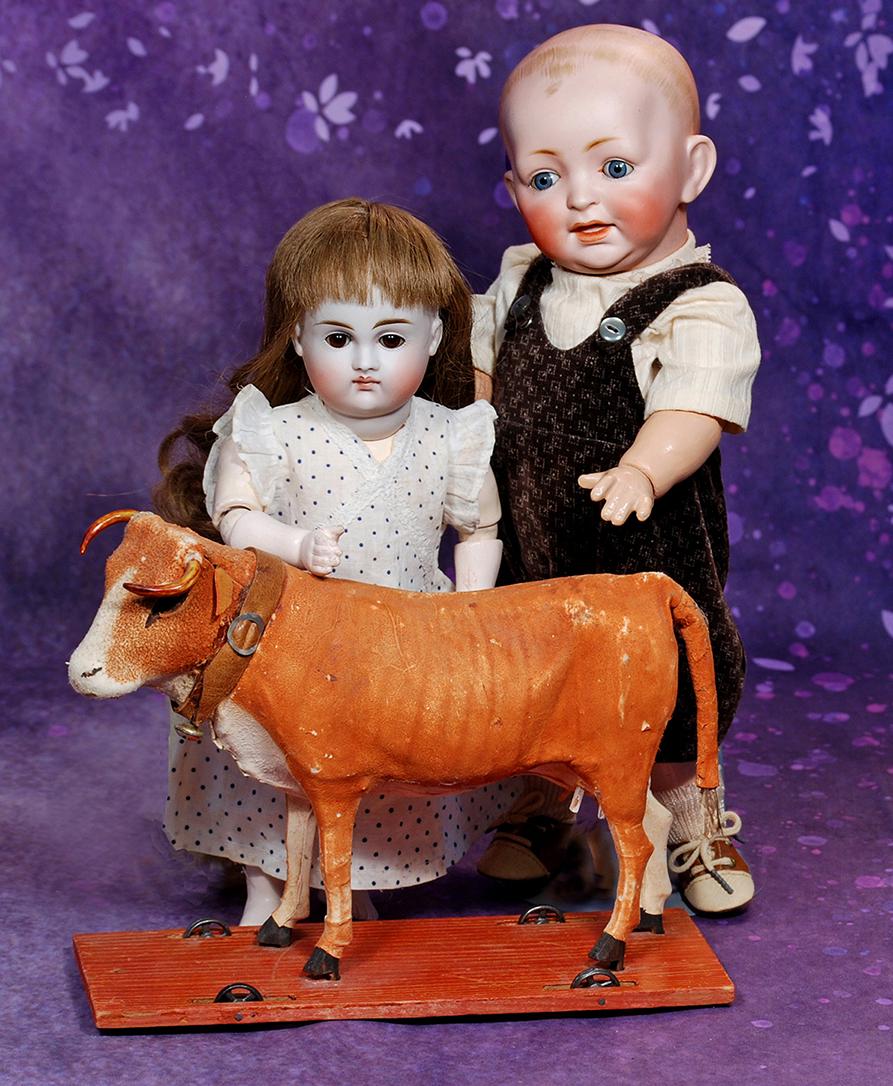 EARLY GERMAN BISQUE POUTY BY KESTNER.  12”.  Marks: 7.  Bisque socket head, plump short (1 of 3)