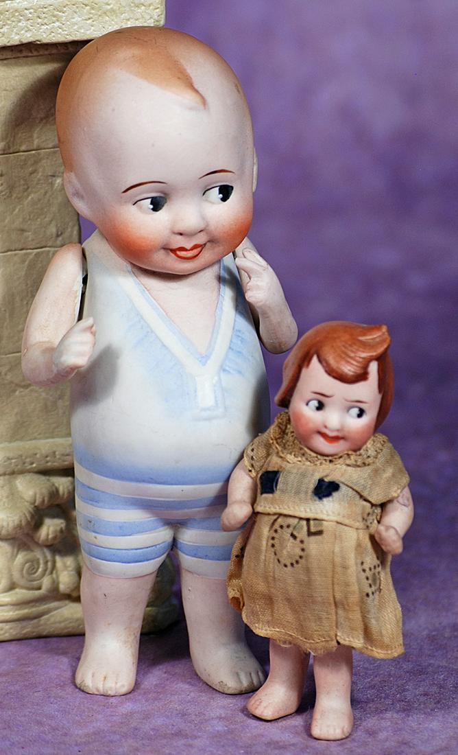 TWO GERMAN ALL-BISQUE CHARACTER DOLLS.  5 ½” doll in painted blue and white suit, painted (1 of 1)